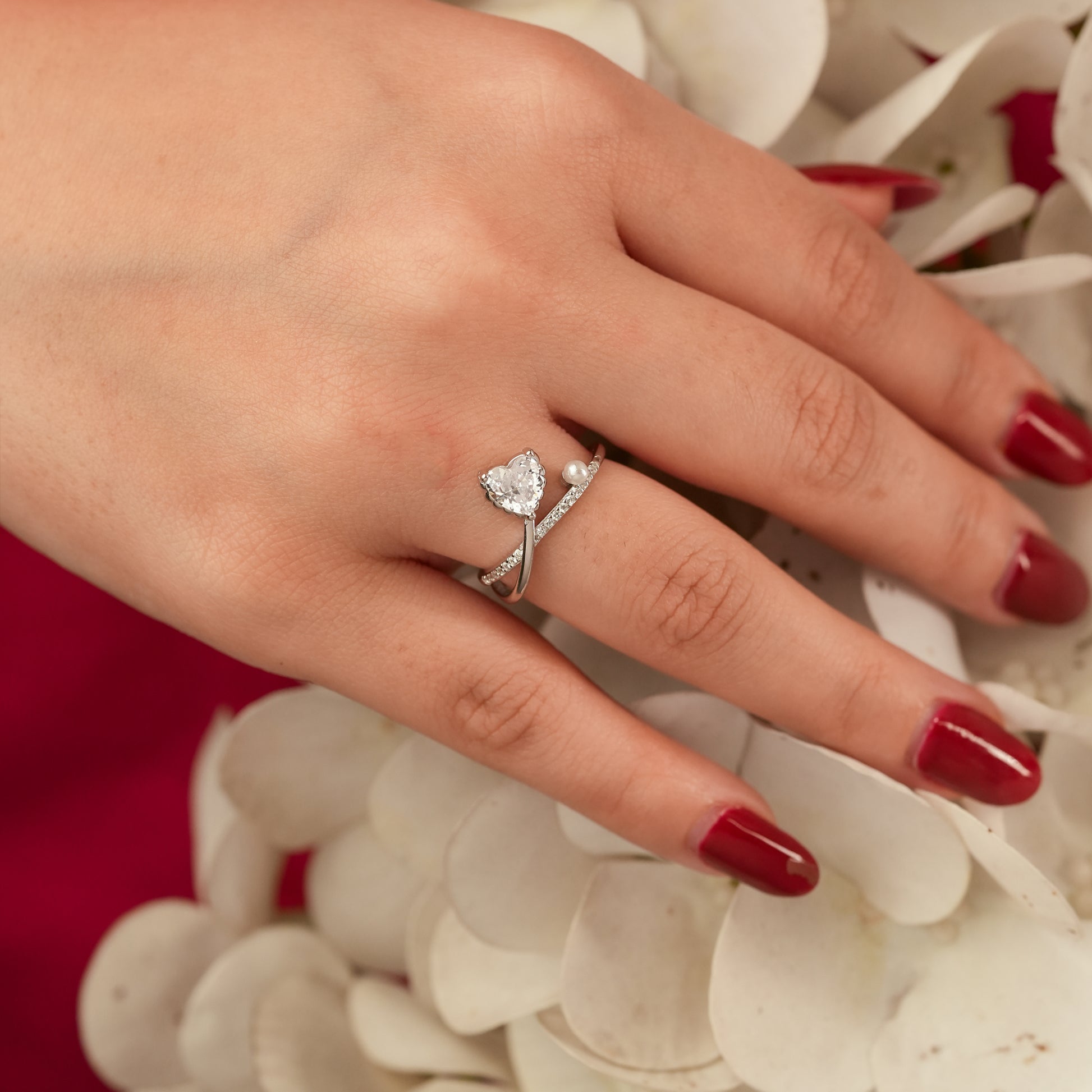 Serene Heart Ring with a diamond and pearl