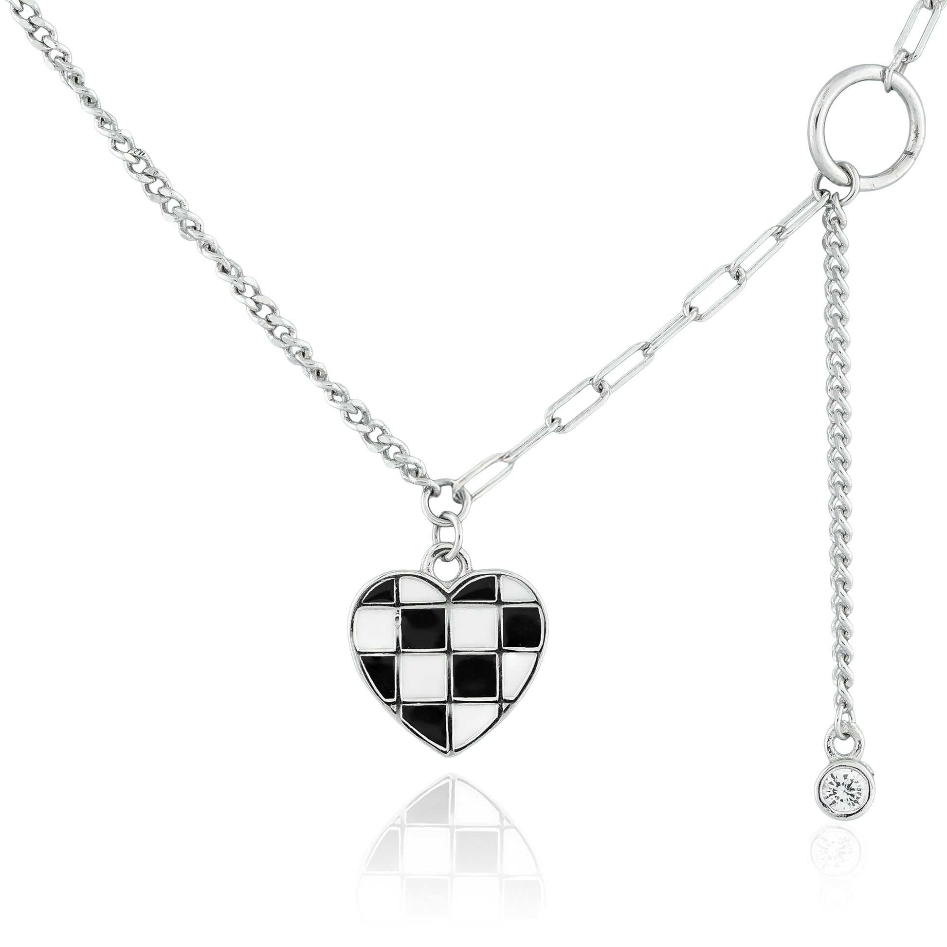 Close-up of the Checkmate Heart Y-Link Necklace featuring a checkerboard heart pendant with enamel detailing and a crystal drop on a Y-link chain.