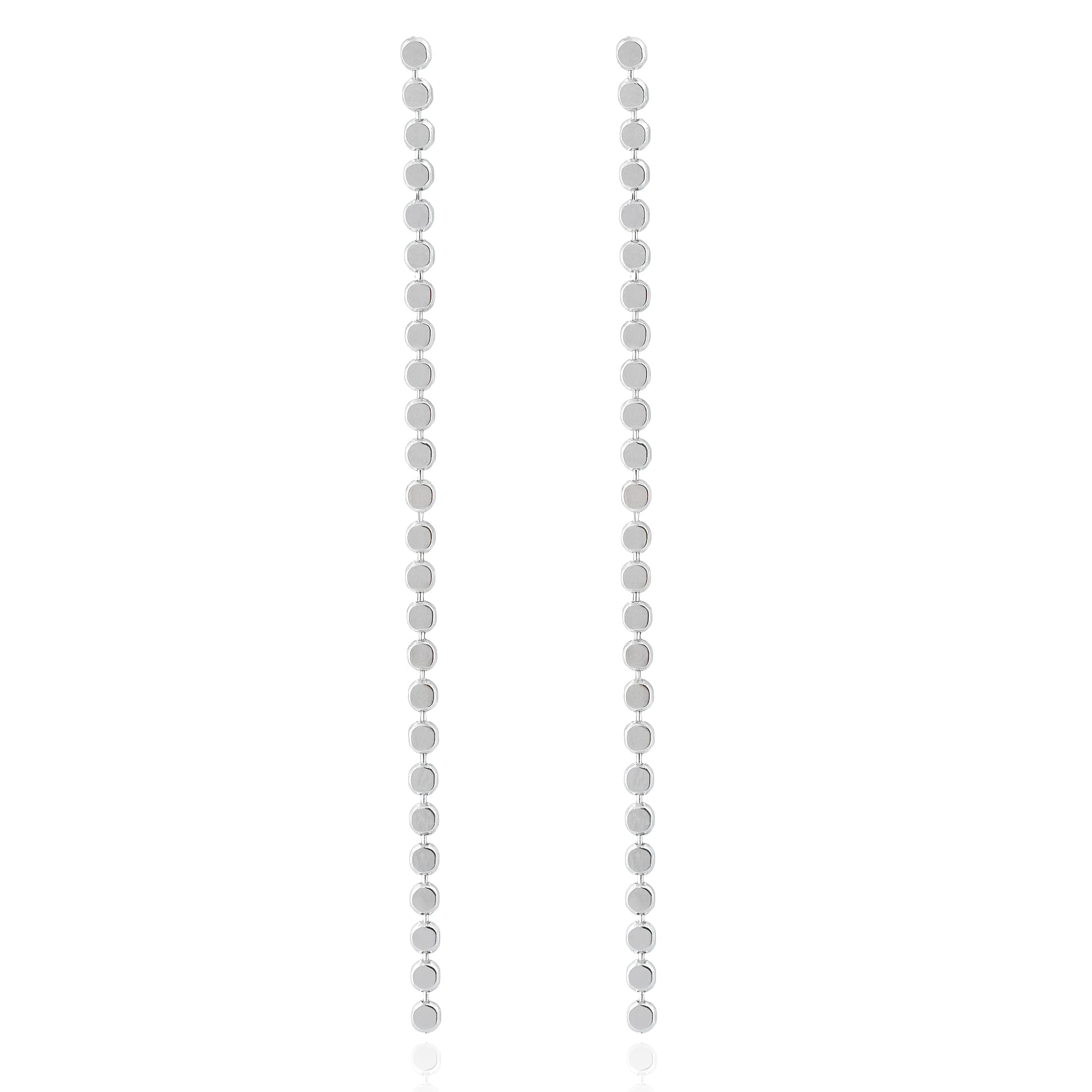 Close-up of Silver Cascade Earrings featuring a vertical line of polished circular discs with a high-shine finish
