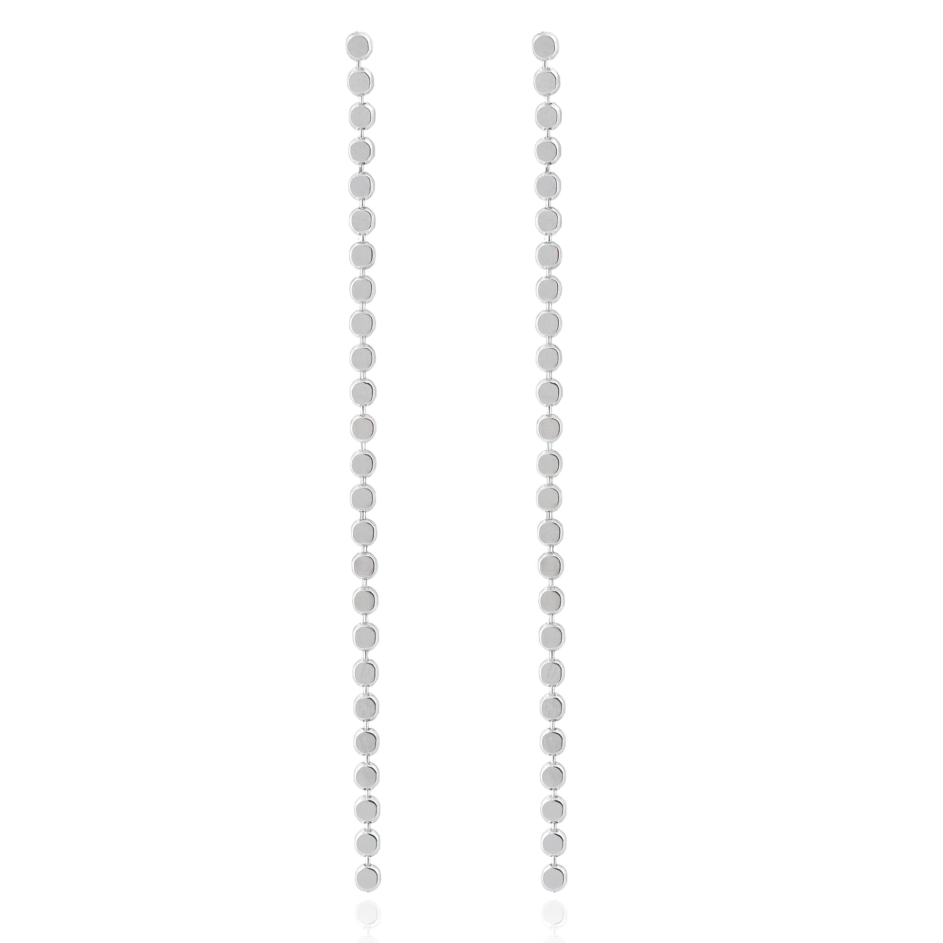 Close-up of Silver Cascade Earrings featuring a vertical line of polished circular discs with a high-shine finish