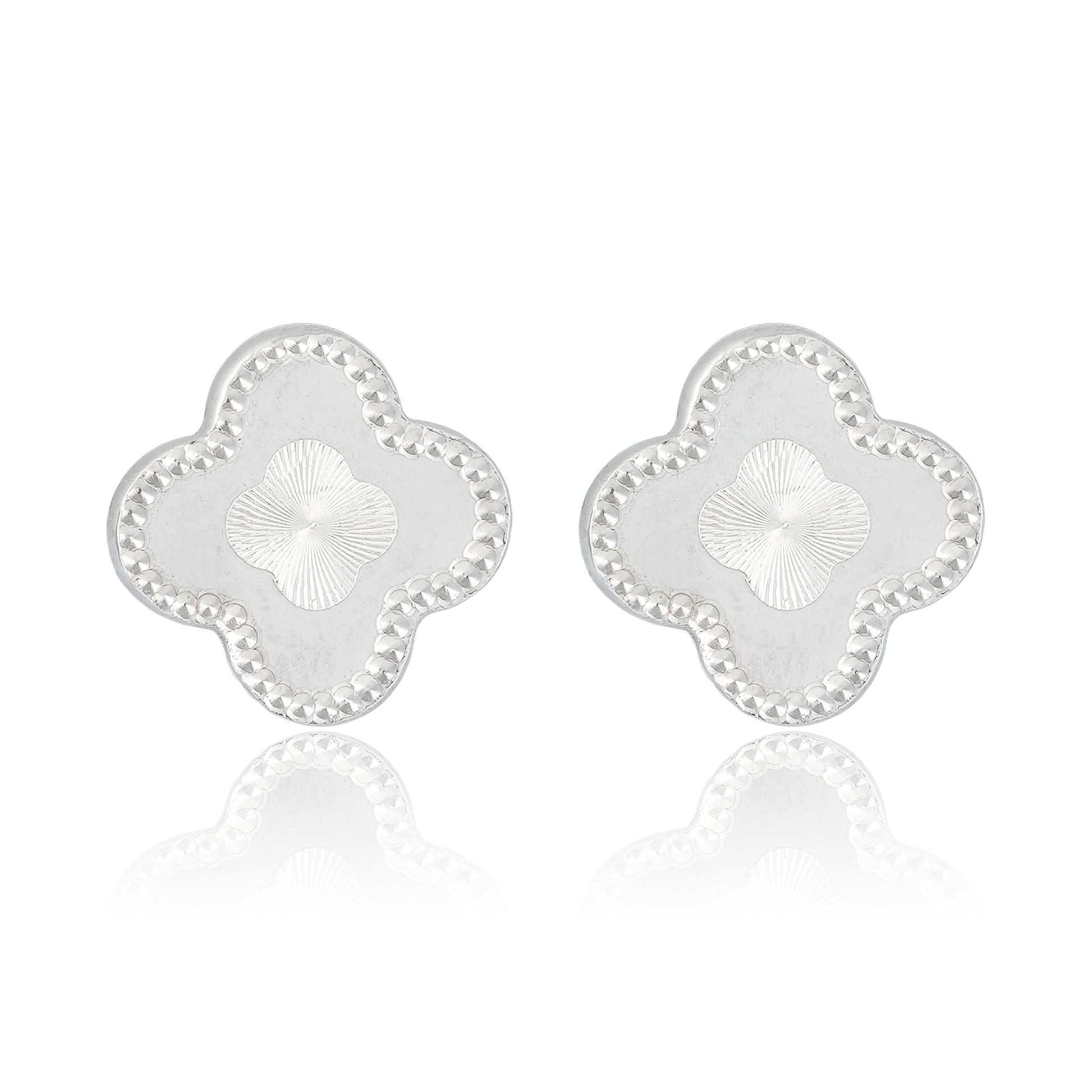 Silver quatrefoil stud earrings with a beaded border and radiant sunburst center, displayed on a plain backdrop.