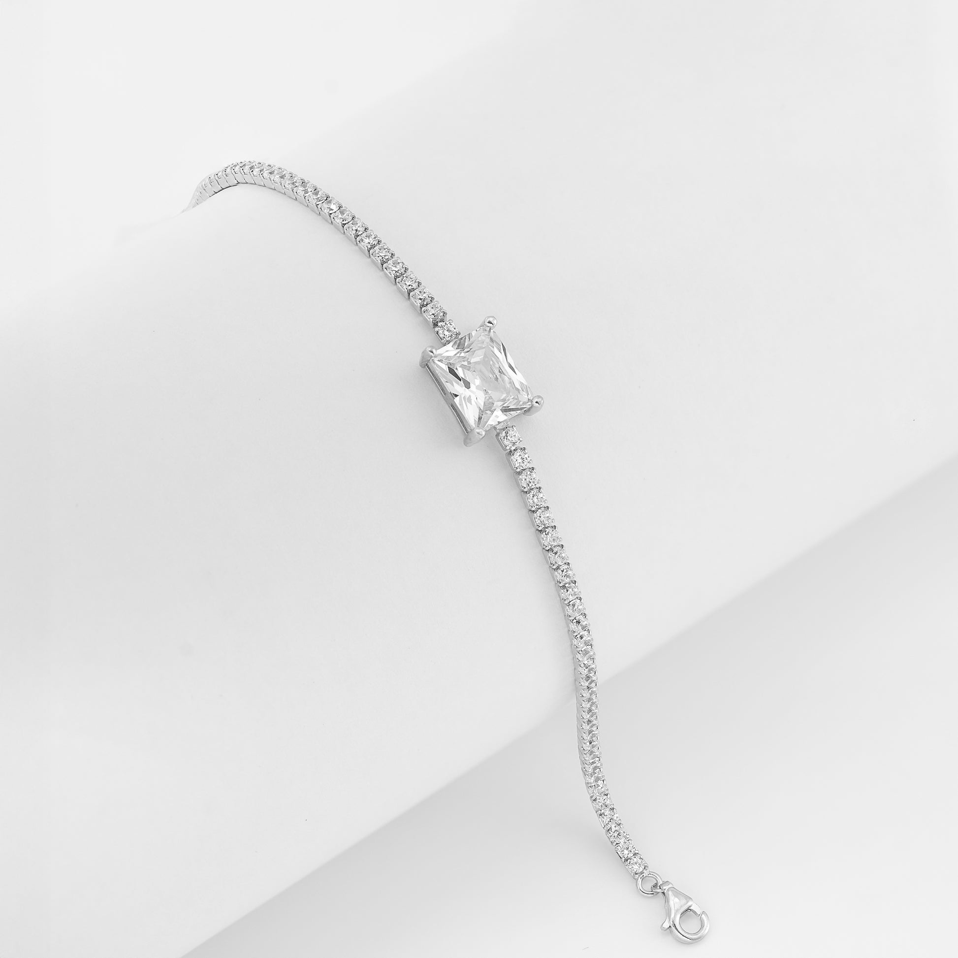 Starlit Grace bracelet with princess-cut solitaire and CZ stones in sterling silver