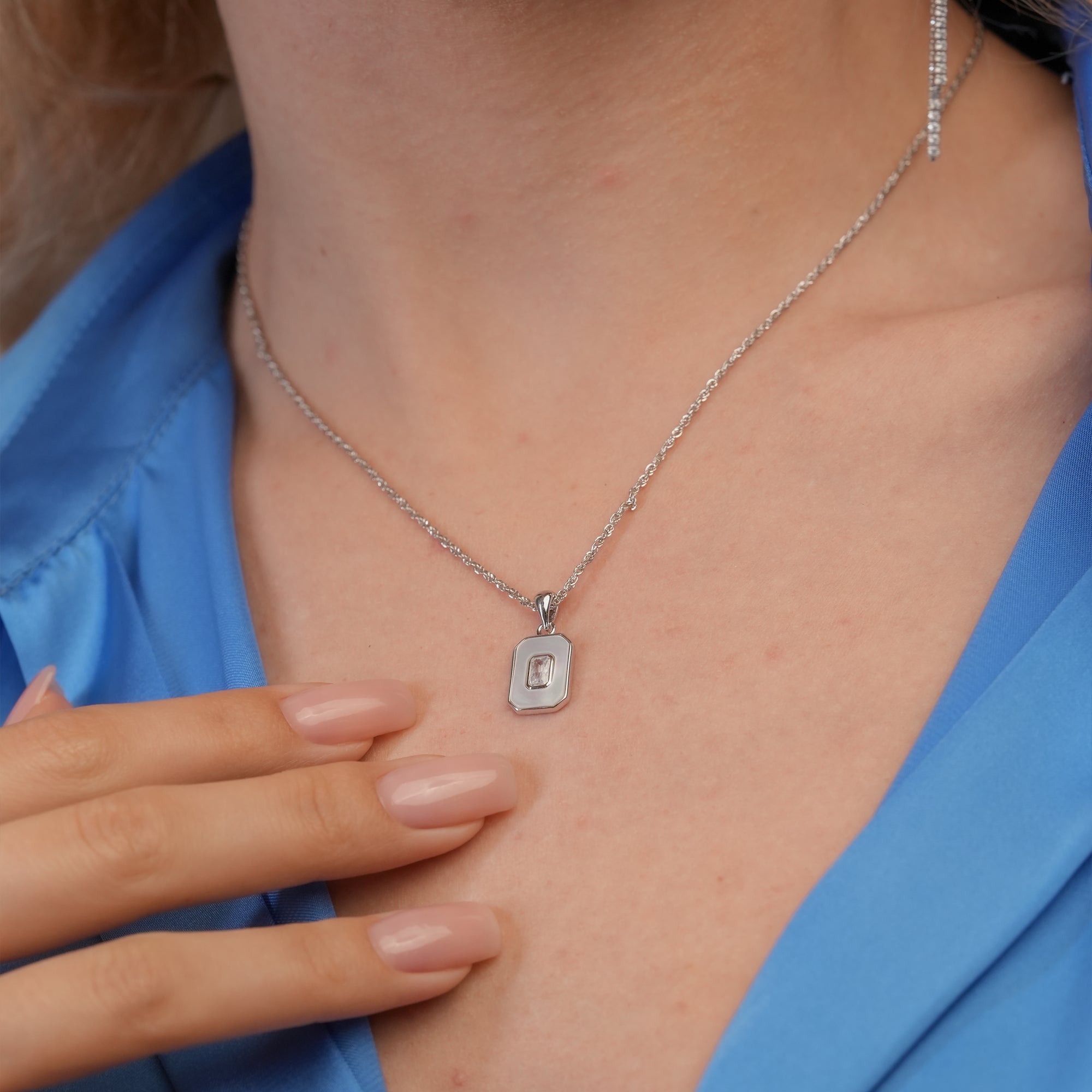 Solitaire Tag Necklace – Sterling Silver with Baguette-Cut Stone