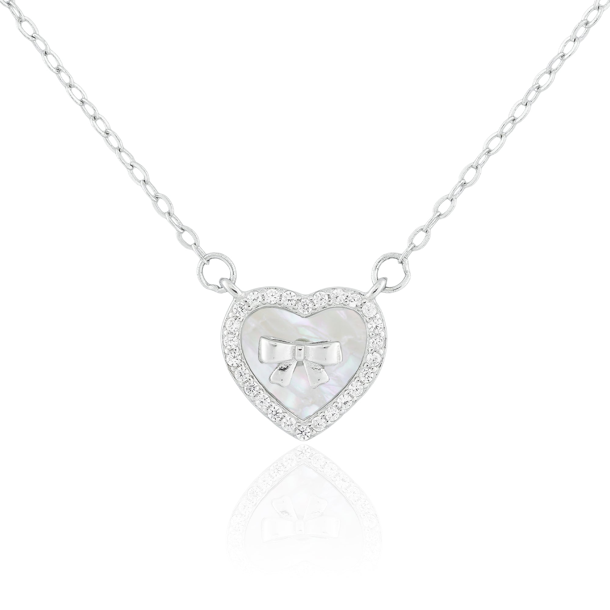 Close-up of the Heart of Grace Necklace featuring a mother-of-pearl heart pendant framed with a crystal halo and delicate silver bow.