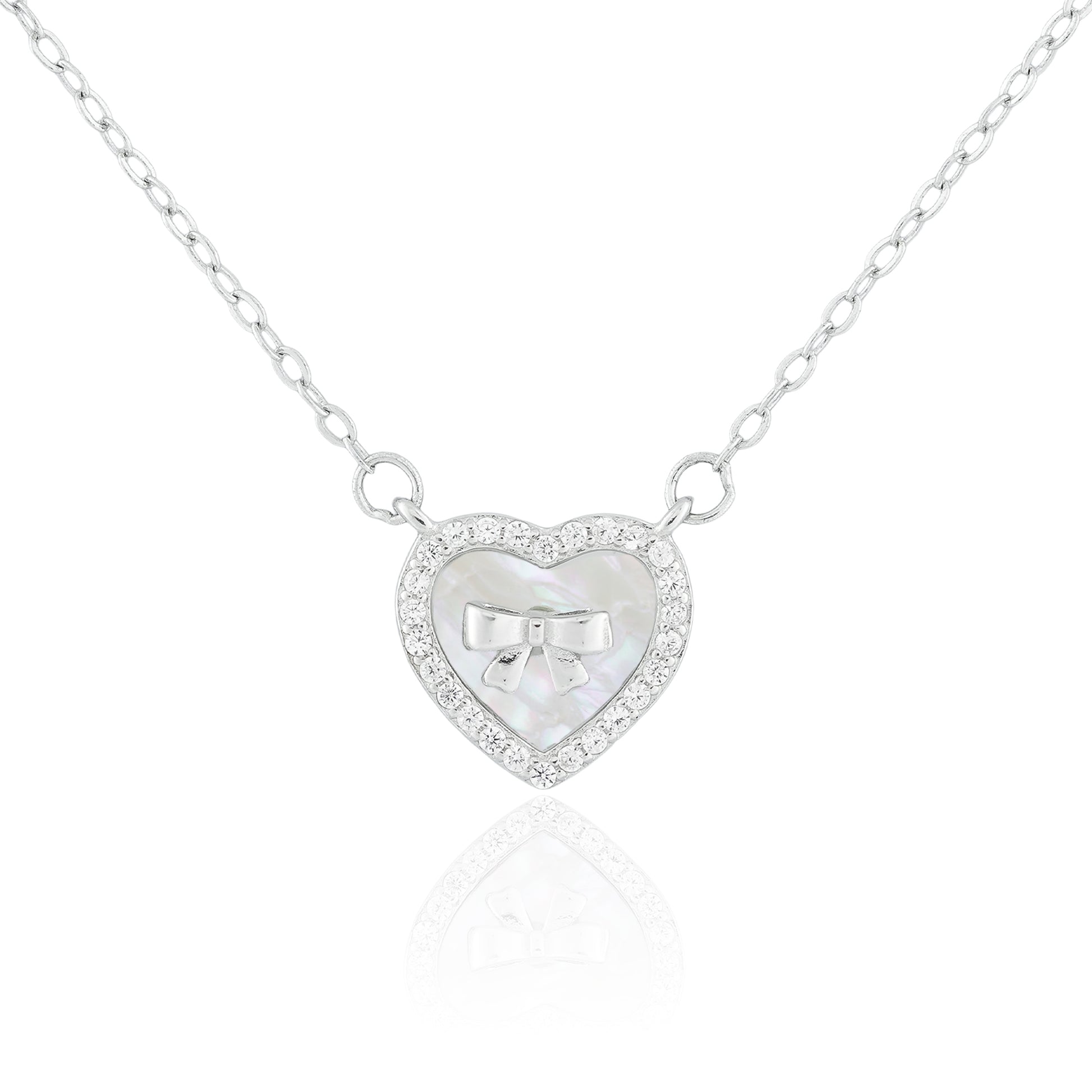 Close-up of the Heart of Grace Necklace featuring a mother-of-pearl heart pendant framed with a crystal halo and delicate silver bow.