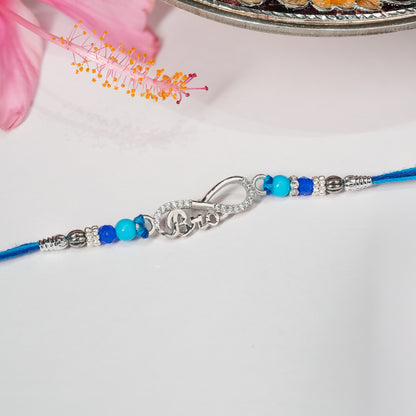 Bracelet with blue beads and silver clasp on a white background