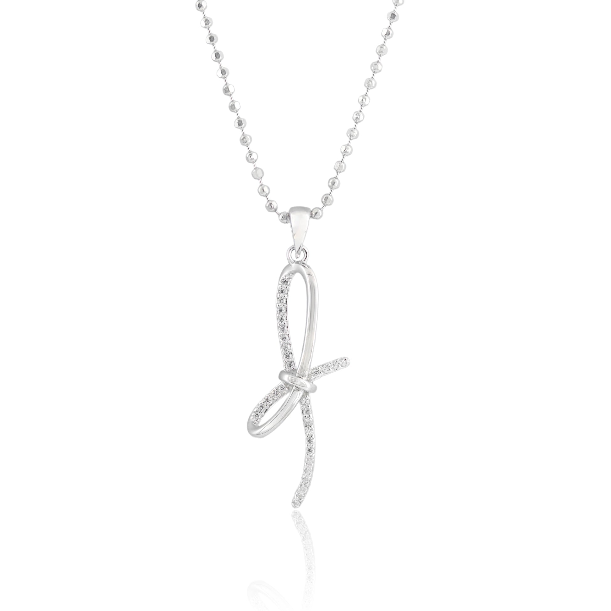 Close-up of the Liora Script Sparkle Necklace featuring a script-style pendant with pavé-set crystals and a knotted design, crafted in sterling silver.