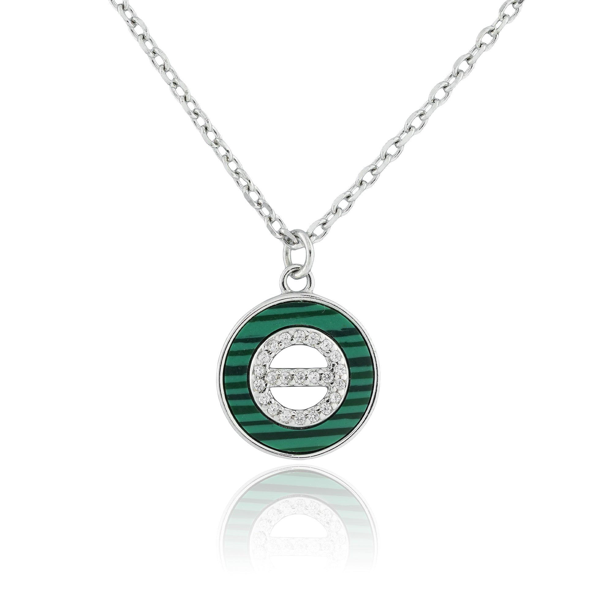  Close-up of the Malachite Orbit Pendant Necklace featuring a circular green malachite inlay with a central cubic zirconia on a sterling silver chain.