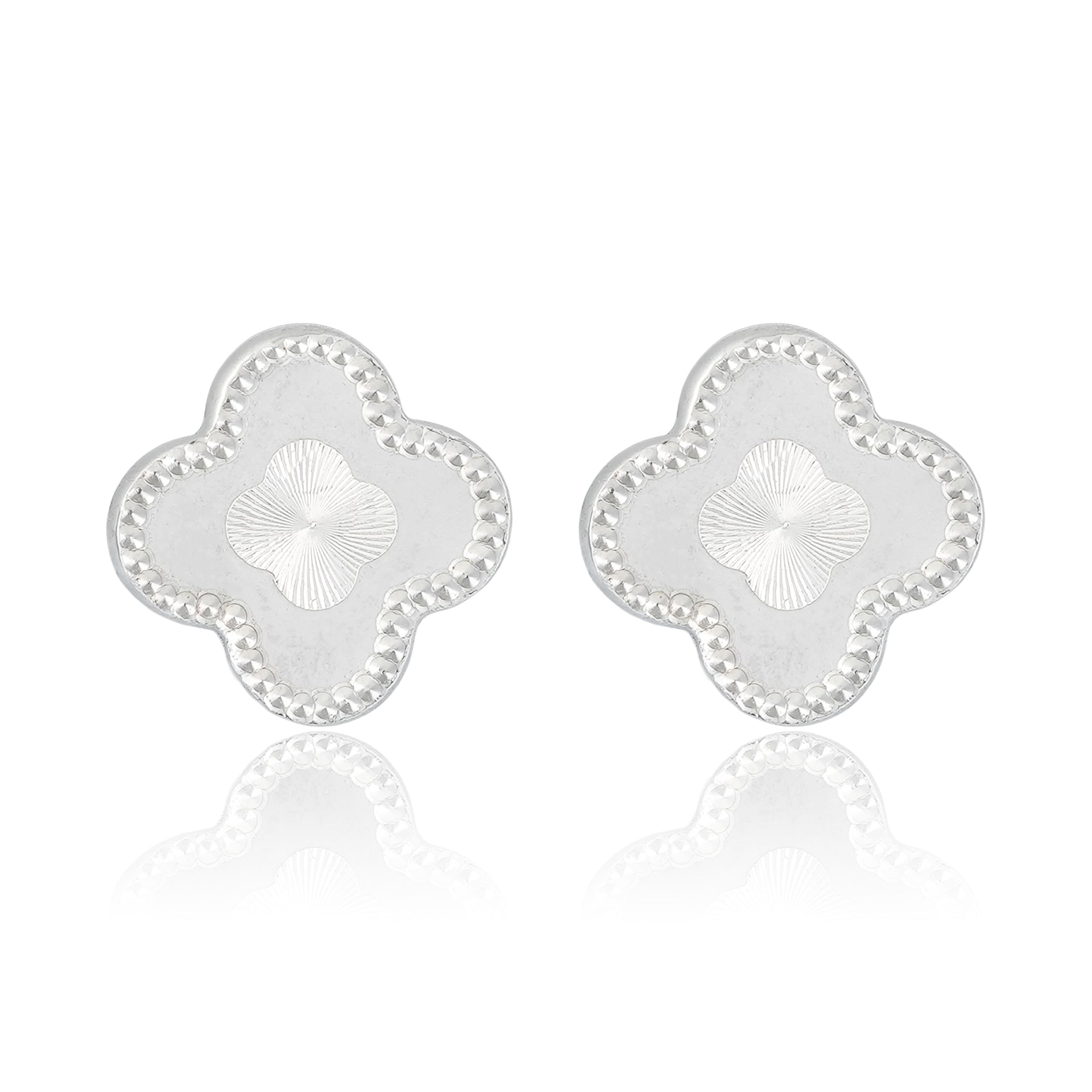  Silver quatrefoil stud earrings with a beaded border and radiant sunburst center, displayed on a plain backdrop.
