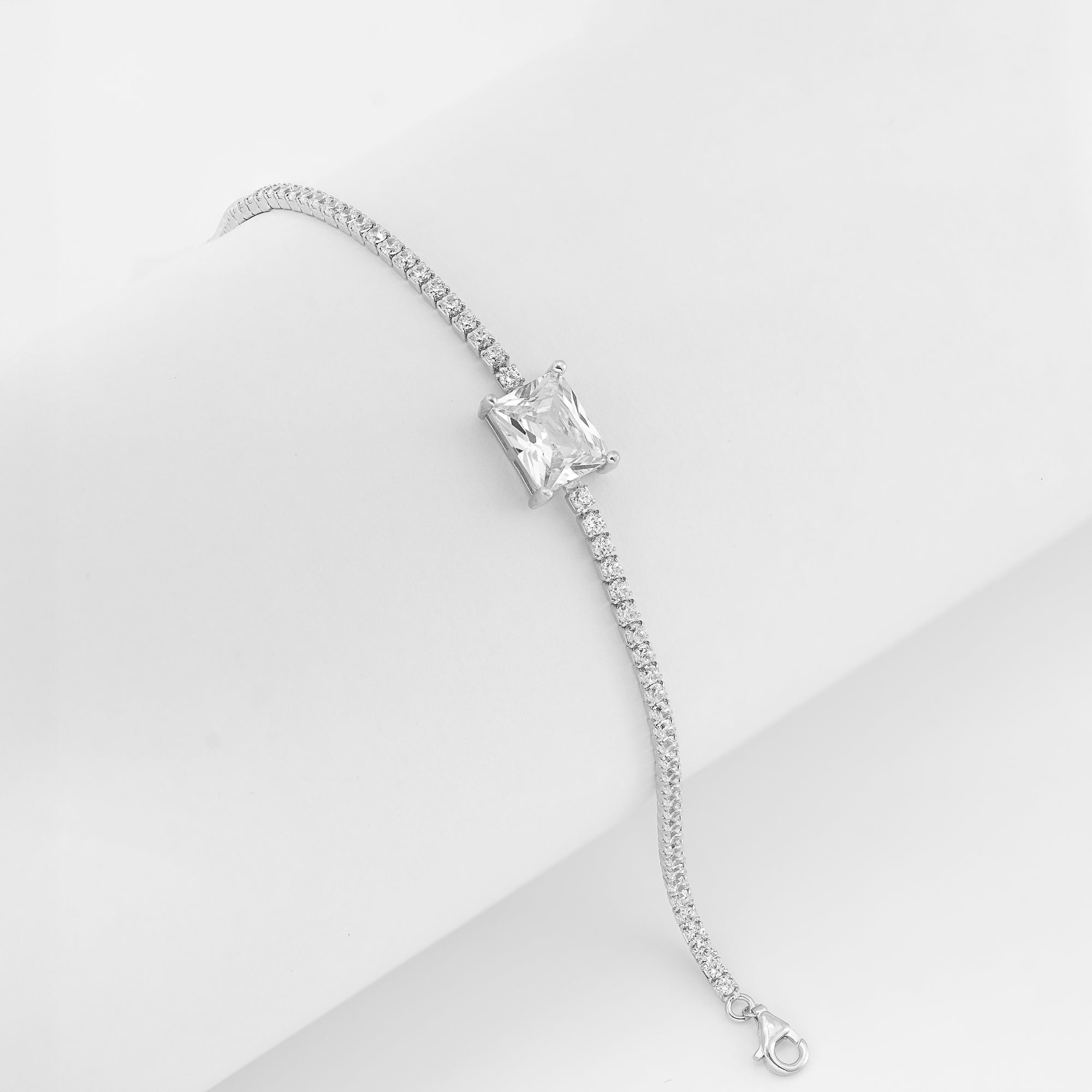 Starlit Grace bracelet with princess-cut solitaire and CZ stones in sterling silver