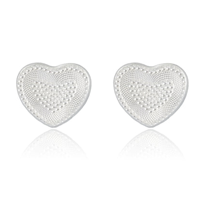  Close-up view of sterling silver heart-shaped stud earrings with a lace-inspired textured surface, handcrafted for elegance.