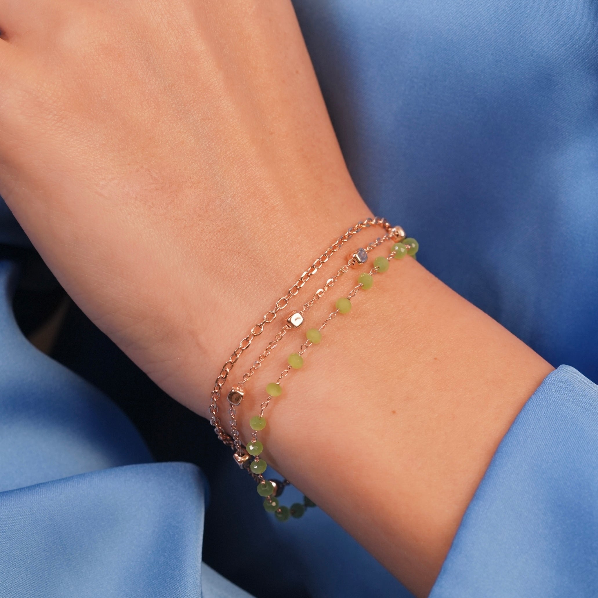 Model showcasing the Bead Bloom Layered Bracelet with summer attire for a relaxed and earthy chic look.
