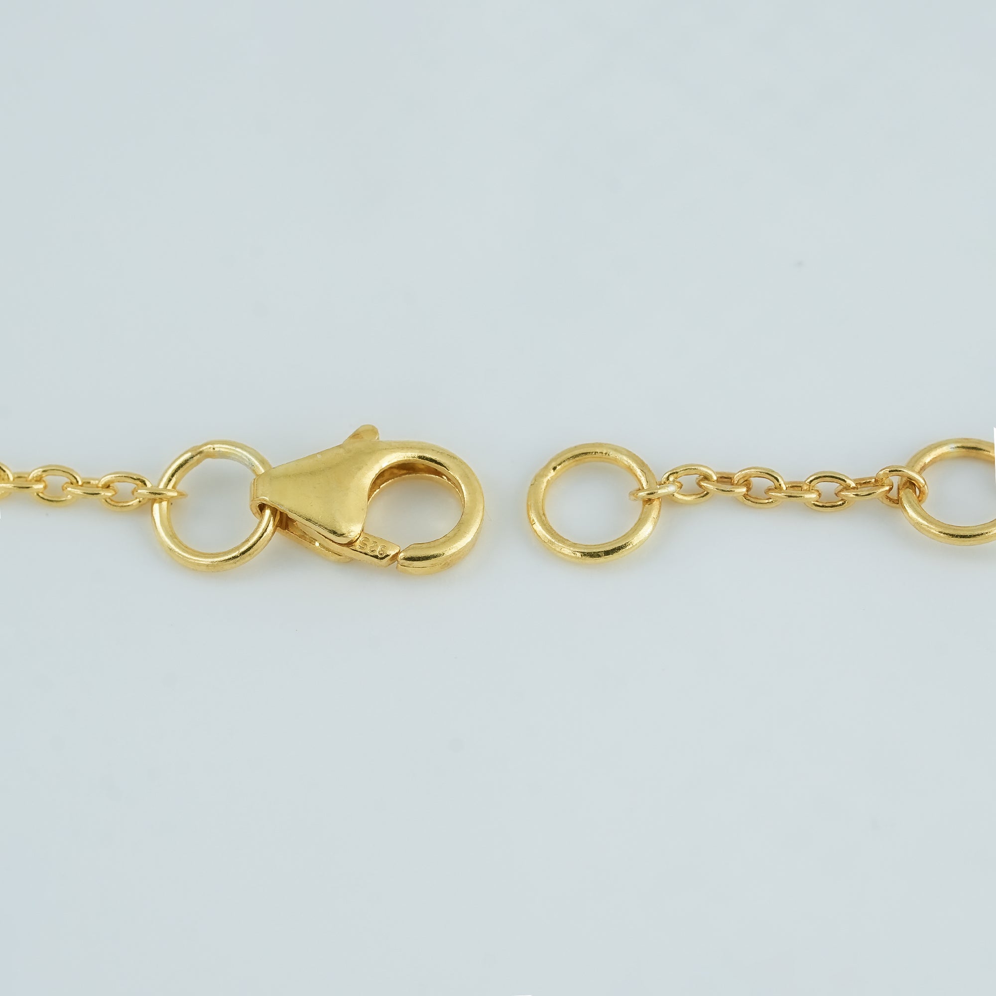 "Adjustable gold-plated clasp on 925 sterling silver Ruby Rose Garden Bracelet with 6-inch fit and 0.5-inch extension."